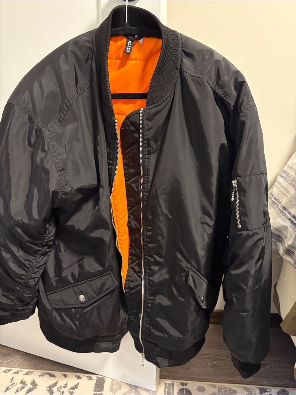 Women’s Oversized Black Bomber Jacket with Orange Lining